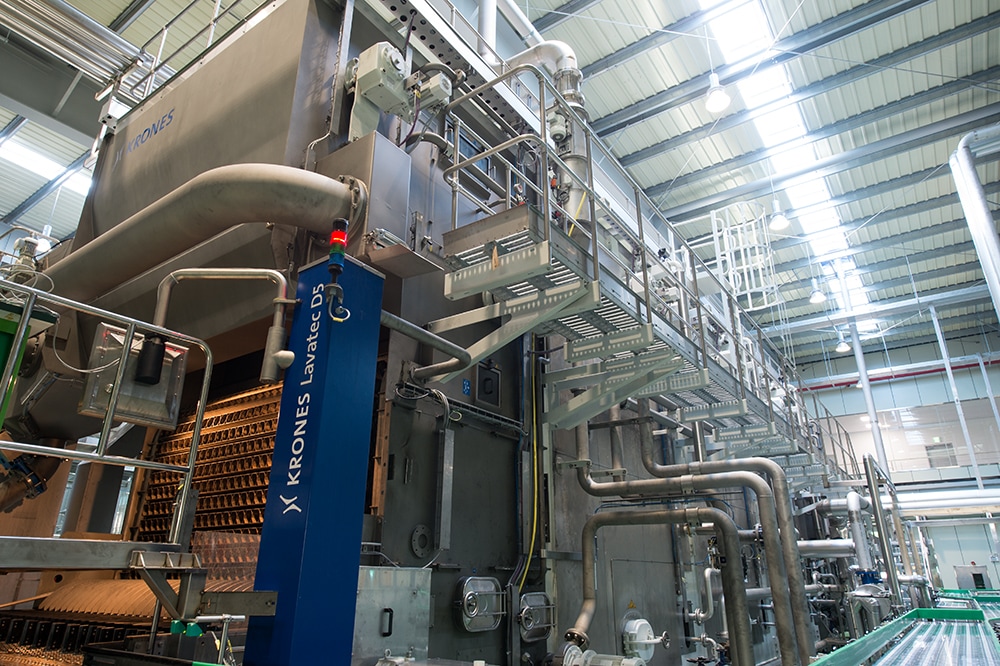 The returnable-glass line rated at 36,000 bottles an hour includes a Lavatec D5 double-end bottle washer.
