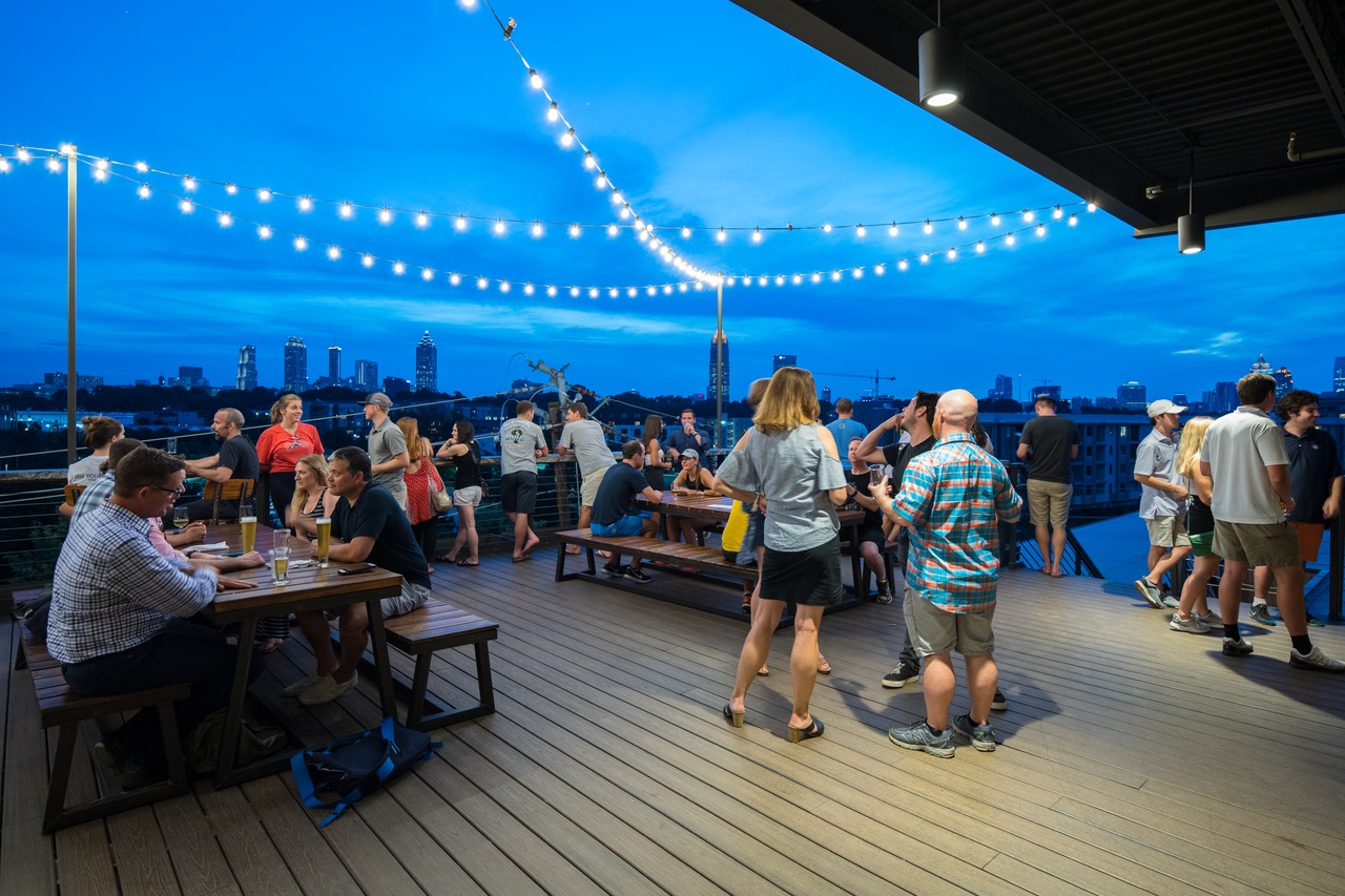 New Realm Brewing is located on Atlanta's BeltLine, a 22 mile loop around the city centre. The brewery contains a main dining room, a bar, a rooftop patio, and a beer garden accommodating up to 400 guests with views directly into the brewery operation. 